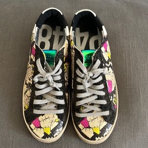 John Piuma/Python
P448 size 8